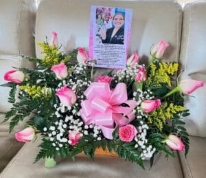 Arreglo ovalado de 15 rosas R 06